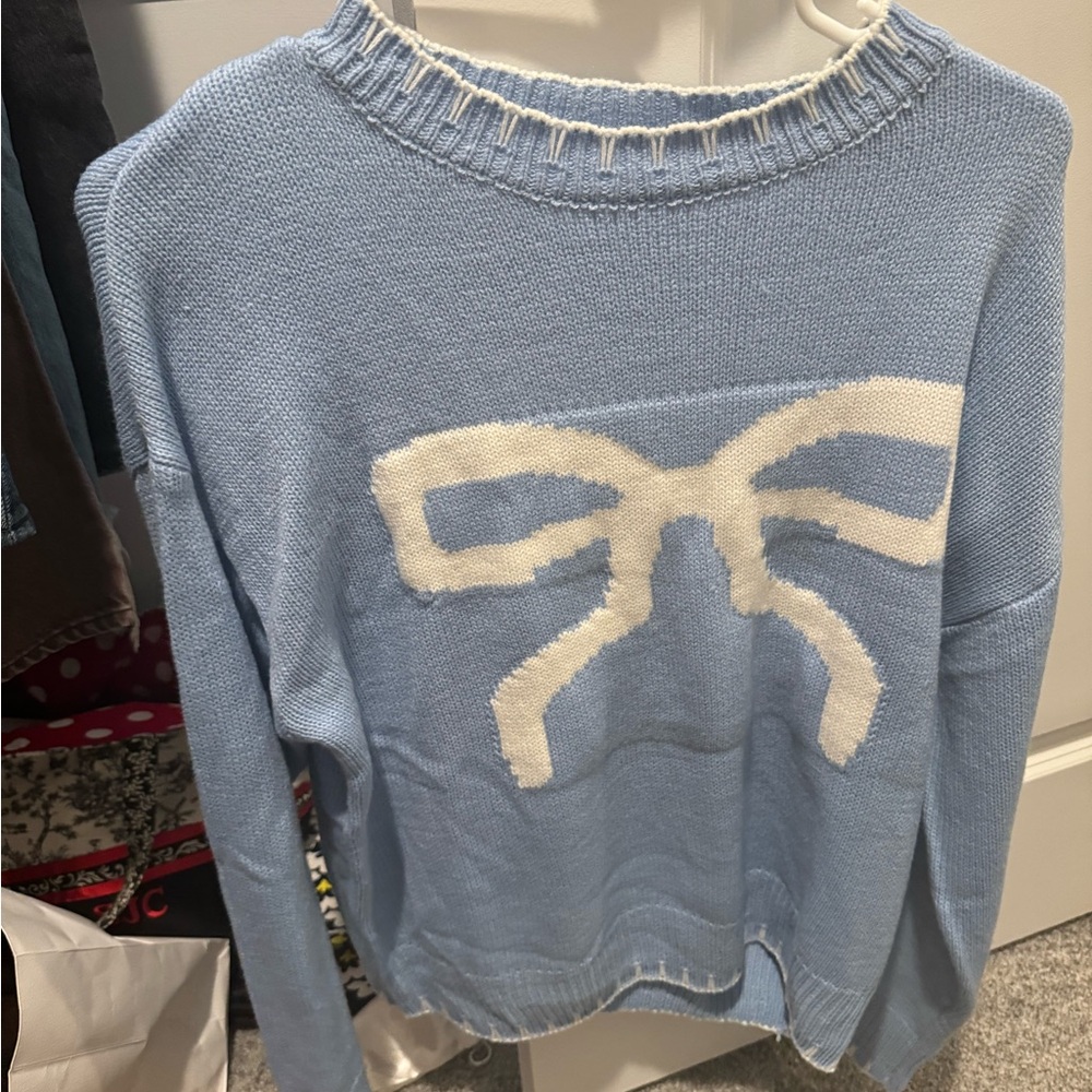 Blue and White Crew Neck Sweater with Bow Design